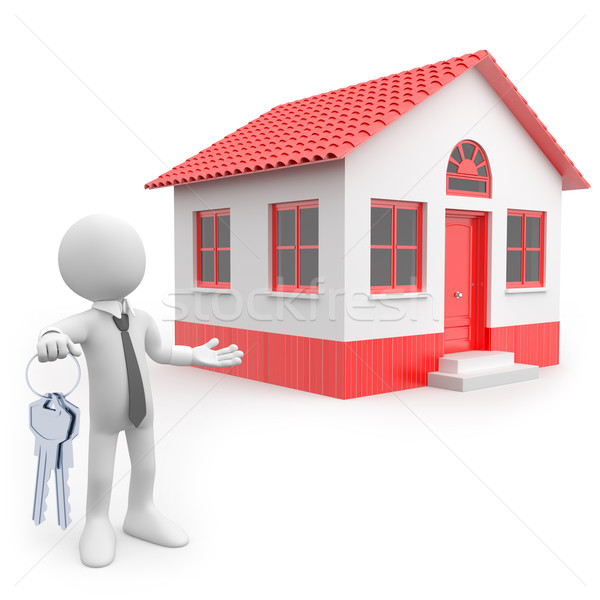 Businessman with a bunch of keys in his hand next to a house Stock photo © texelart