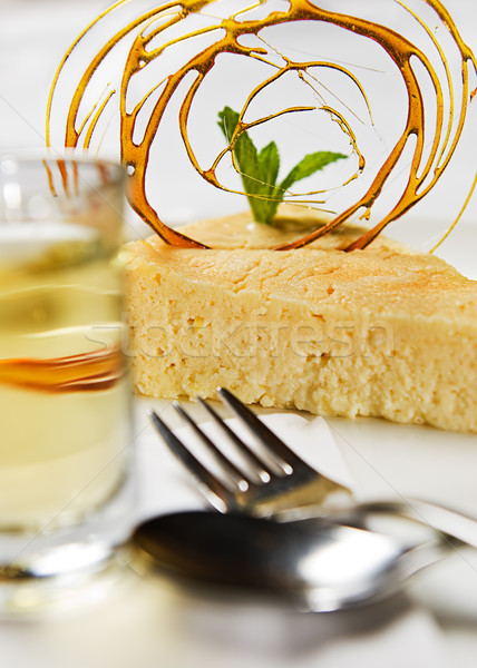 Délicieux cheesecake tranche servi sirop dessert [[stock_photo]] © thisboy