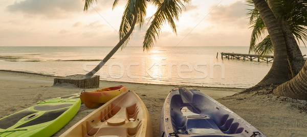 Beach Sunrise With Kayaks Stock photo © THP