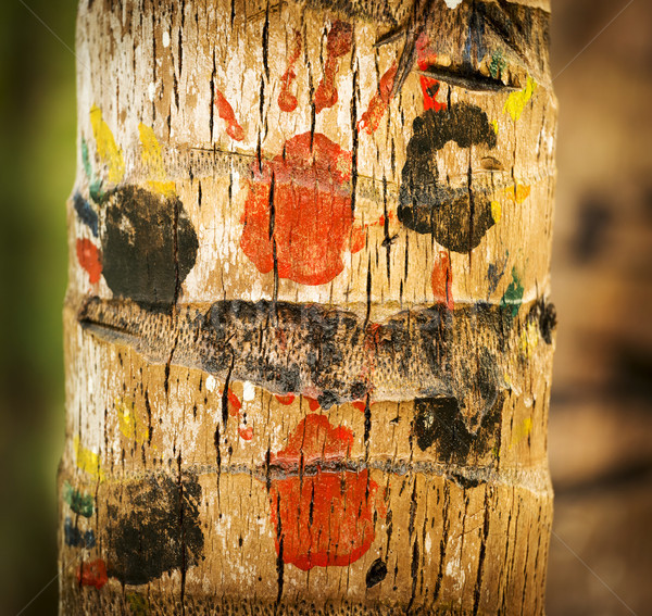 Childrens Handprints On Tree Trunk Stock photo © THP