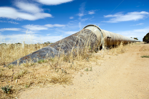 Eau pipeline au-dessus sol rural Photo stock © THP