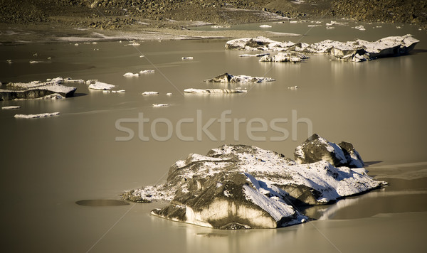 Montanas nieve hielo rock agua puesta de sol Foto stock © THP