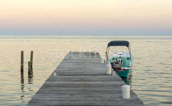 Boat And Jetty At Sunrise Stock photo © THP