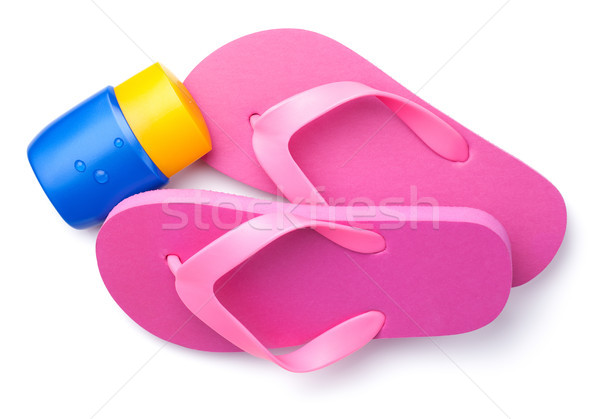 Summer Flip Flops with Suntan Cream Isolated on White Background Stock photo © ThreeArt