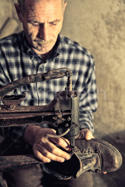 Stock photo: cobbler at work