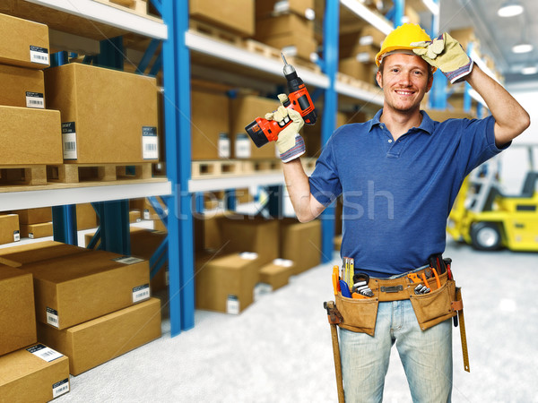 Stock photo: handyman in warehouse