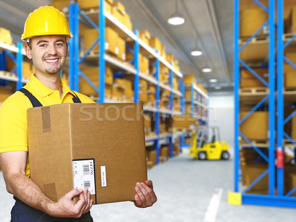 Stock photo: manual worker with parcel