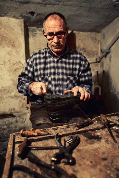 cobbler at work Stock photo © tiero
