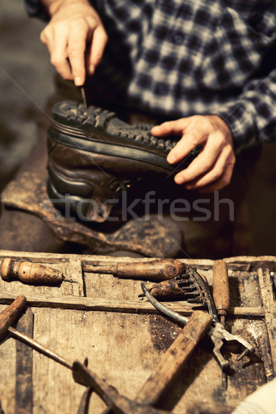 Stock photo: cobbler at work