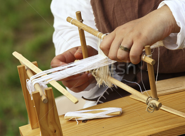loom and hands Stock photo © tiero