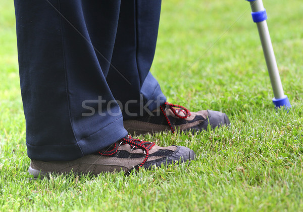 Stock photo: crutches and legs