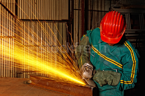heavy industry manual worker with grinder  Stock photo © tiero