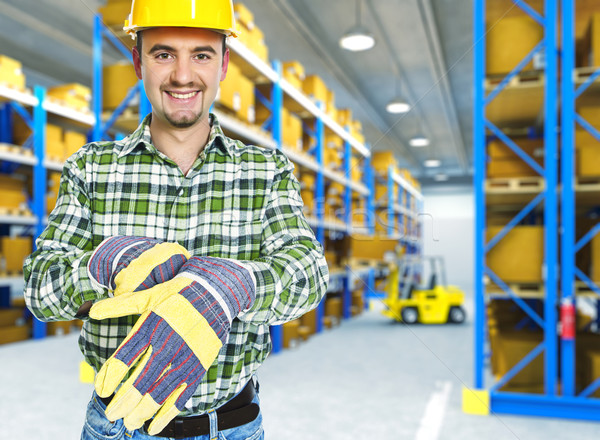 Stock photo: manual worker in a warehouse