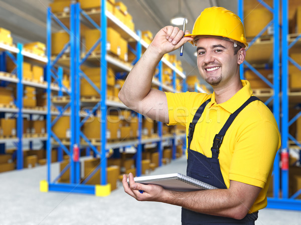 smiling worker in warehouse Stock photo © tiero