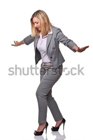 Acrobat acţiona ca femeie echilibra Imagine de stoc © tiero