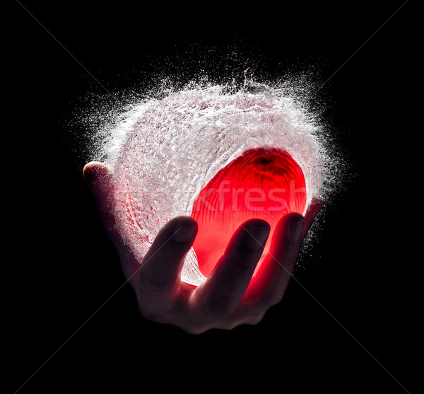 Víz robbanás emberi kéz háttér piros fekete Stock fotó © tiero