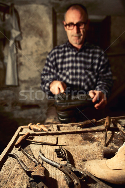 cobbler at work Stock photo © tiero