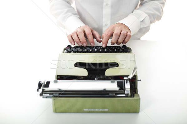 man with vintage typewriter Stock photo © tiero