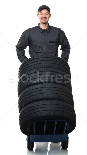 Lavoratore dovere manuale pneumatici bianco Foto d'archivio © tiero