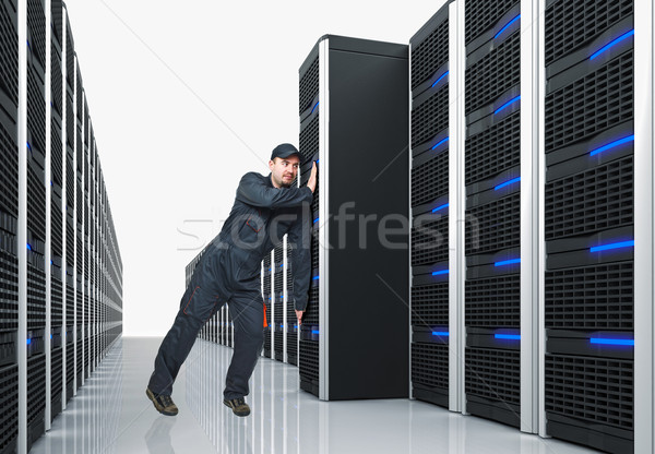 Człowiek przenieść serwera młodych pracownika Zdjęcia stock © tiero