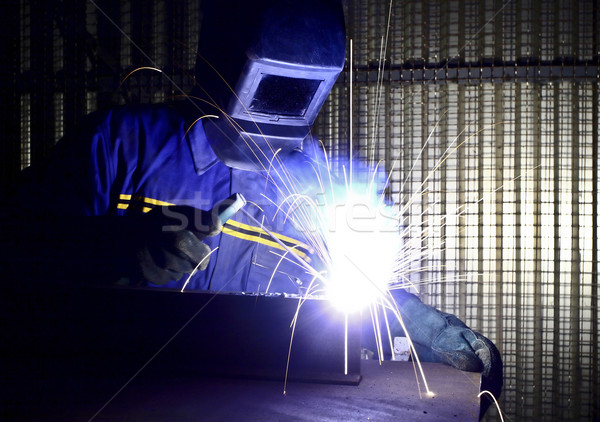 Imagem soldador trabalhar homem metal indústria Foto stock © tiero