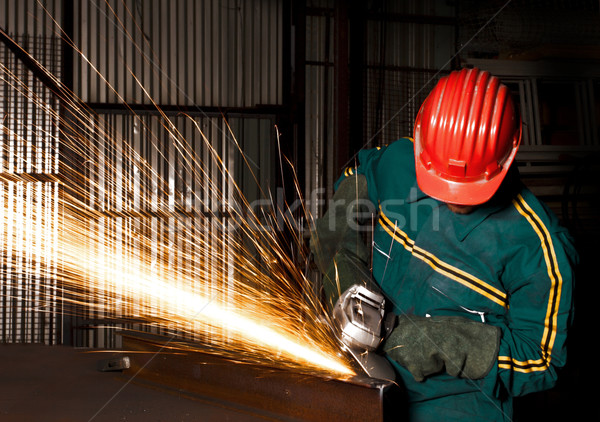 heavy industry manual worker with grinder Stock photo © tiero