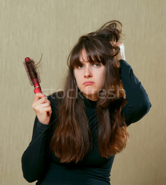 Cheveux frustré femme brosse à cheveux main visage [[stock_photo]] © timbrk