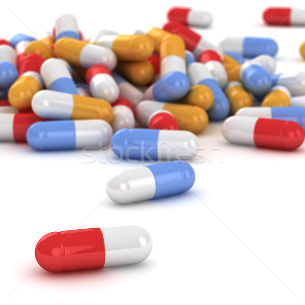Pillole multicolore bianco medici medicina Foto d'archivio © timbrk