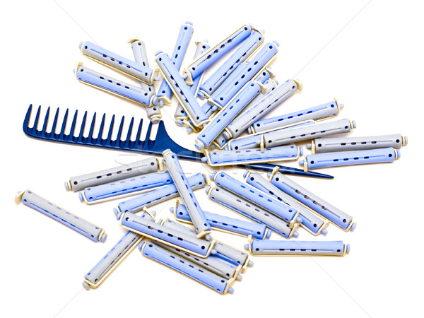 Handle rake and hair rollers Stock photo © timbrk