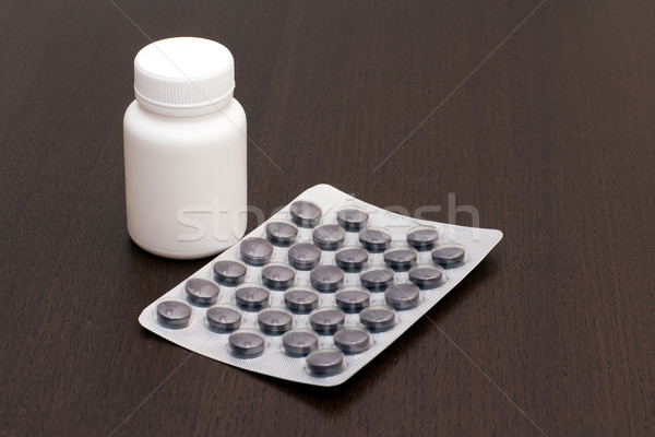 Blanche fiole noir pilules brun propre [[stock_photo]] © timbrk