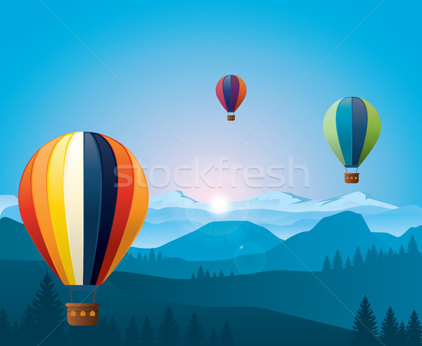 Colorful hot air baloons flying over mountains. Stock photo © tina7shin