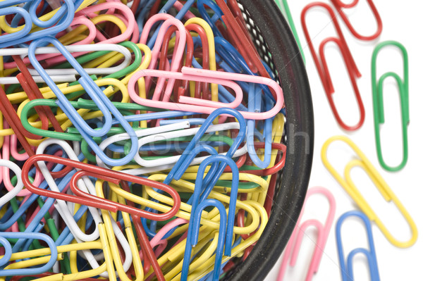 Colourful paper clips on a white background Stock photo © tish1