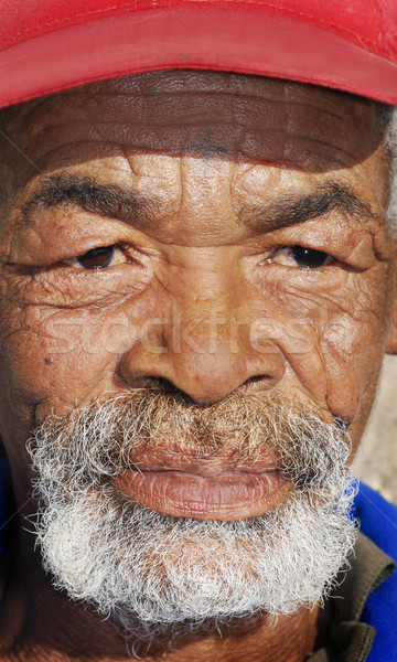 Old African black man with characterful face Stock photo © tish1