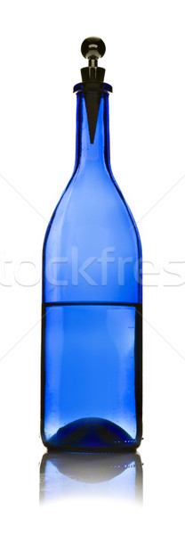 One blue glass bottle with water Stock photo © tish1