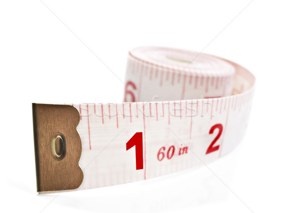 White and red tape measure on a white background Stock photo © tish1