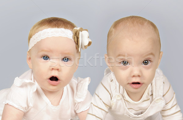 Twin baby fratello sorella ragazza occhi Foto d'archivio © tish1