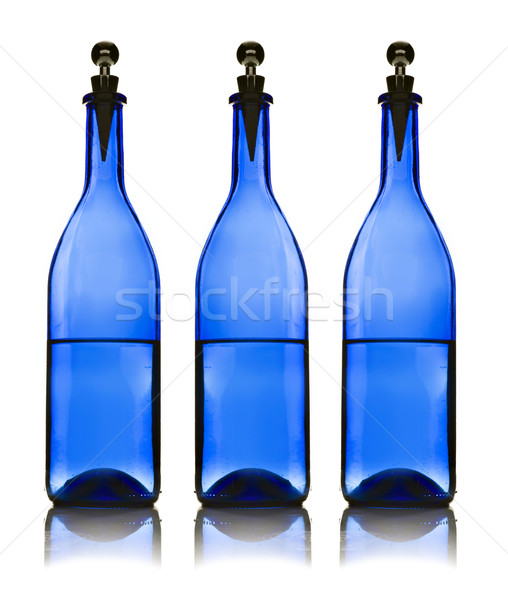 Three blue water bottles on  white background Stock photo © tish1