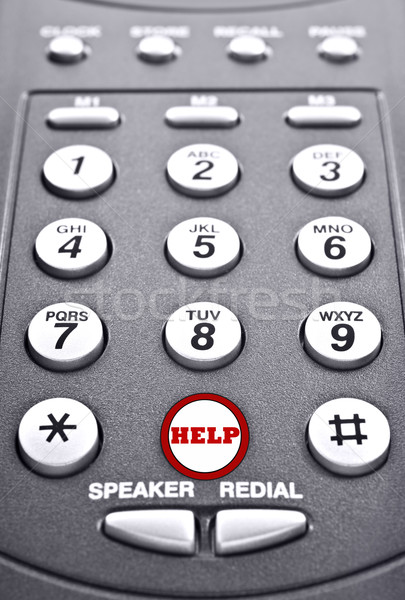 Stock photo: Keypad of a telephone with a red button for help