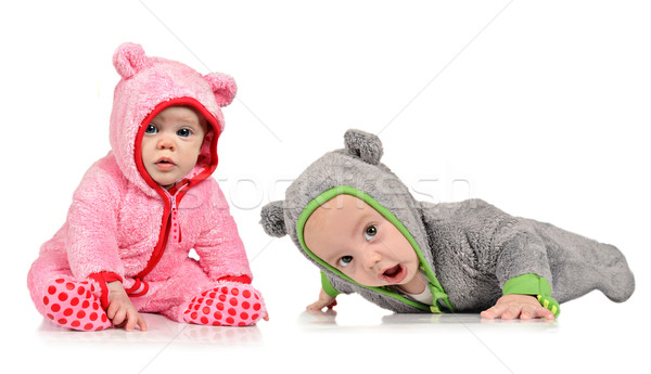 Six month old twin brother and sister on white Stock photo © tish1