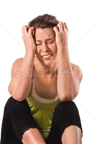 a Very unhappy young woman on a white background Stock photo © tish1