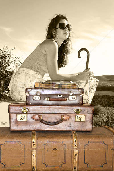 Young woman traveling with her suitcases Stock photo © tish1
