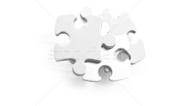 Stainless steel puzzle pieces on white background Stock photo © tish1