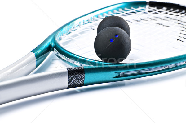 Blue squash racket with balls on white Stock photo © tish1