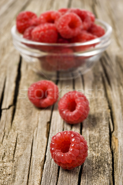 Fresh healthy organic raspberry on wooden background Stock photo © tish1