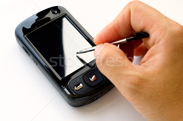 Pda schrijfstift man hand geïsoleerd Stockfoto © tito
