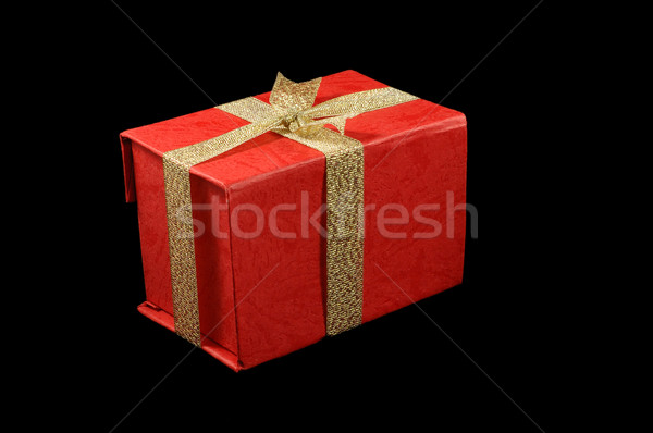 Rood geschenkdoos gouden lint geïsoleerd zwarte Stockfoto © tito