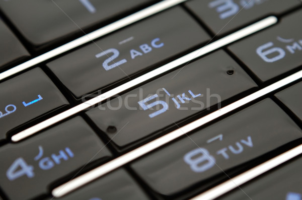 Close up shot of mobile keypad under light Stock photo © tito