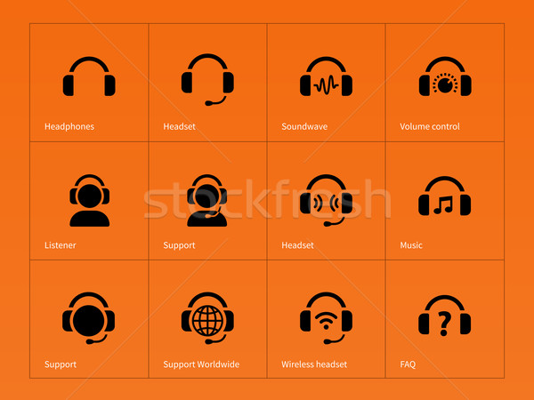 Earphones icons on orange background. Stock photo © tkacchuk