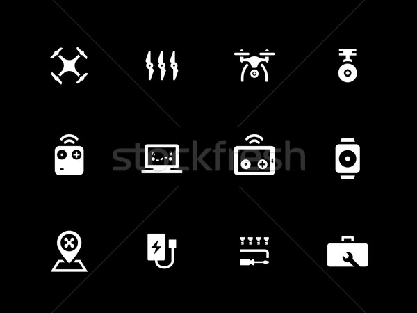 Hexacopter and quadcopter icons on black background. Stock photo © tkacchuk