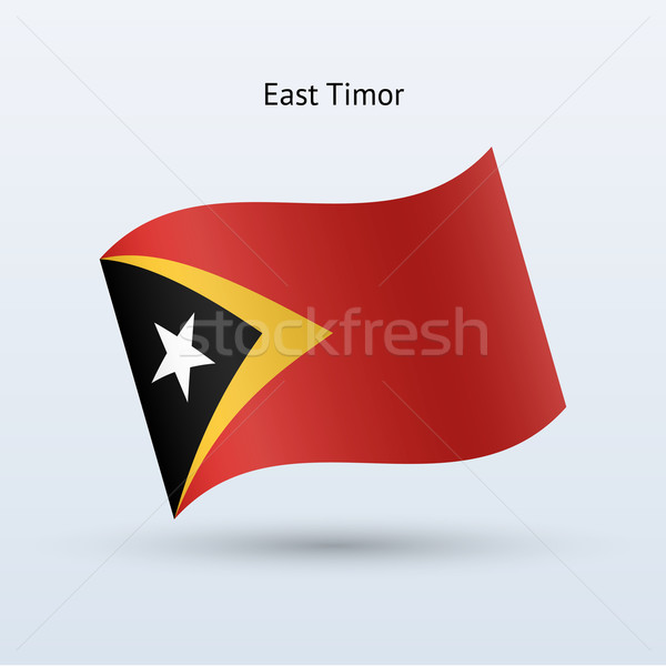 East Timor flag waving form. Vector illustration. Stock photo © tkacchuk